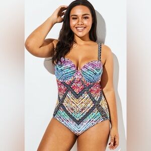 Meet Curve XL technicolor cut out underwire one piece swimsuit. Corset design